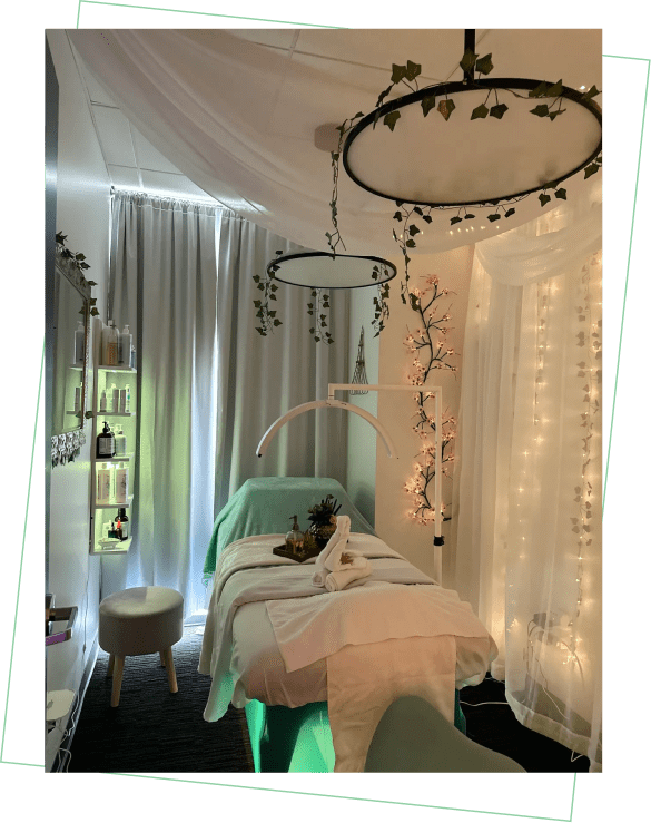 A bed room with a white canopy and lights