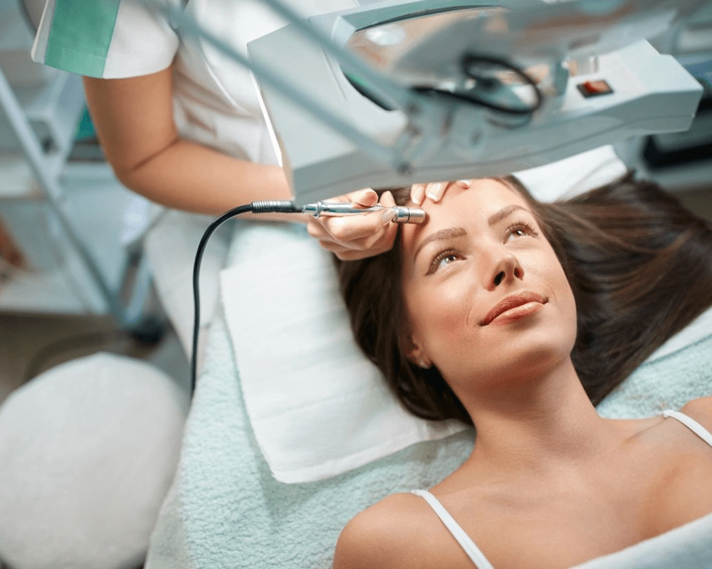 A woman getting her hair cut at the salon